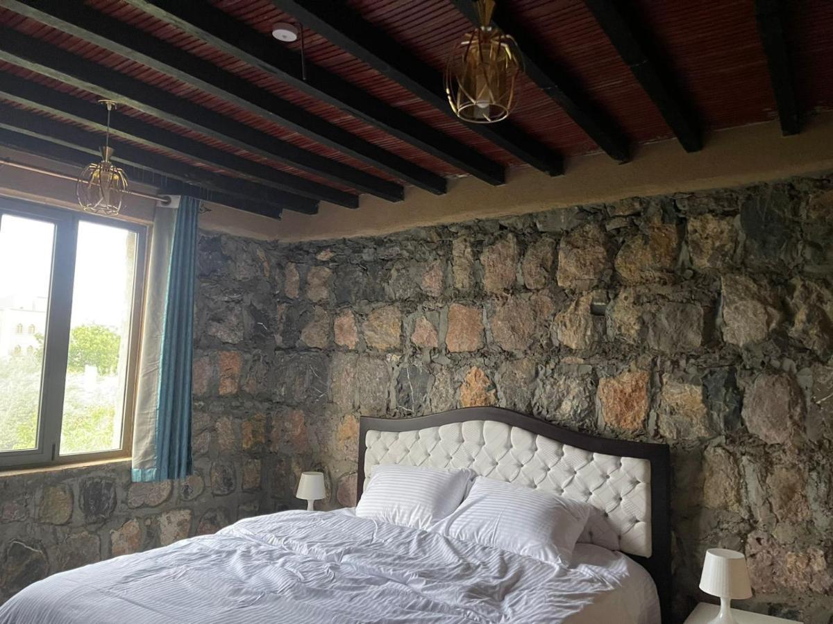 Rose Guesthouse Al 'Aqar Ngoại thất bức ảnh