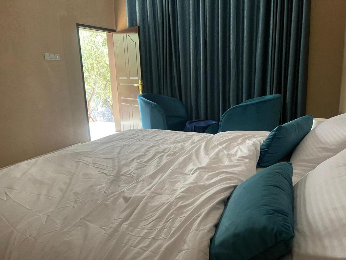 Rose Guesthouse Al 'Aqar Ngoại thất bức ảnh